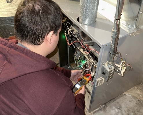 Steve's Technician maintaining a furnace.